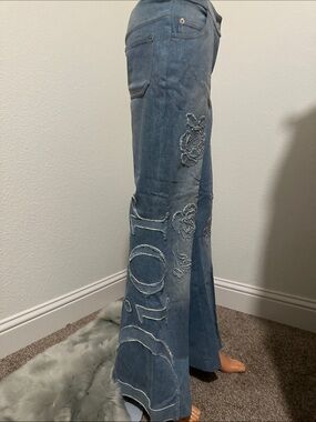 RARE DIOR Blue Embroidered Flared Jeans W/DIOR logo & flowers.